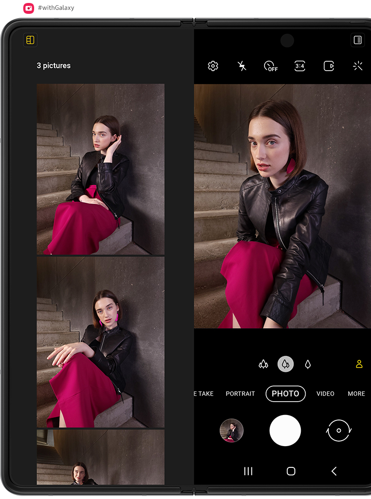 A woman sitting on stairs. Another pose appears, and then another. The photos are floating over unfolded Galaxy Z Fold3 5G. They fall into place the screen inside Capture View Mode in the Camera app. The counter says 2 photos. The shutter snaps and another photo is taken on Galaxy Z Fold3 5G, and the photos shift again to show the bigger view of photos just taken. The counter now says 3 photos.
