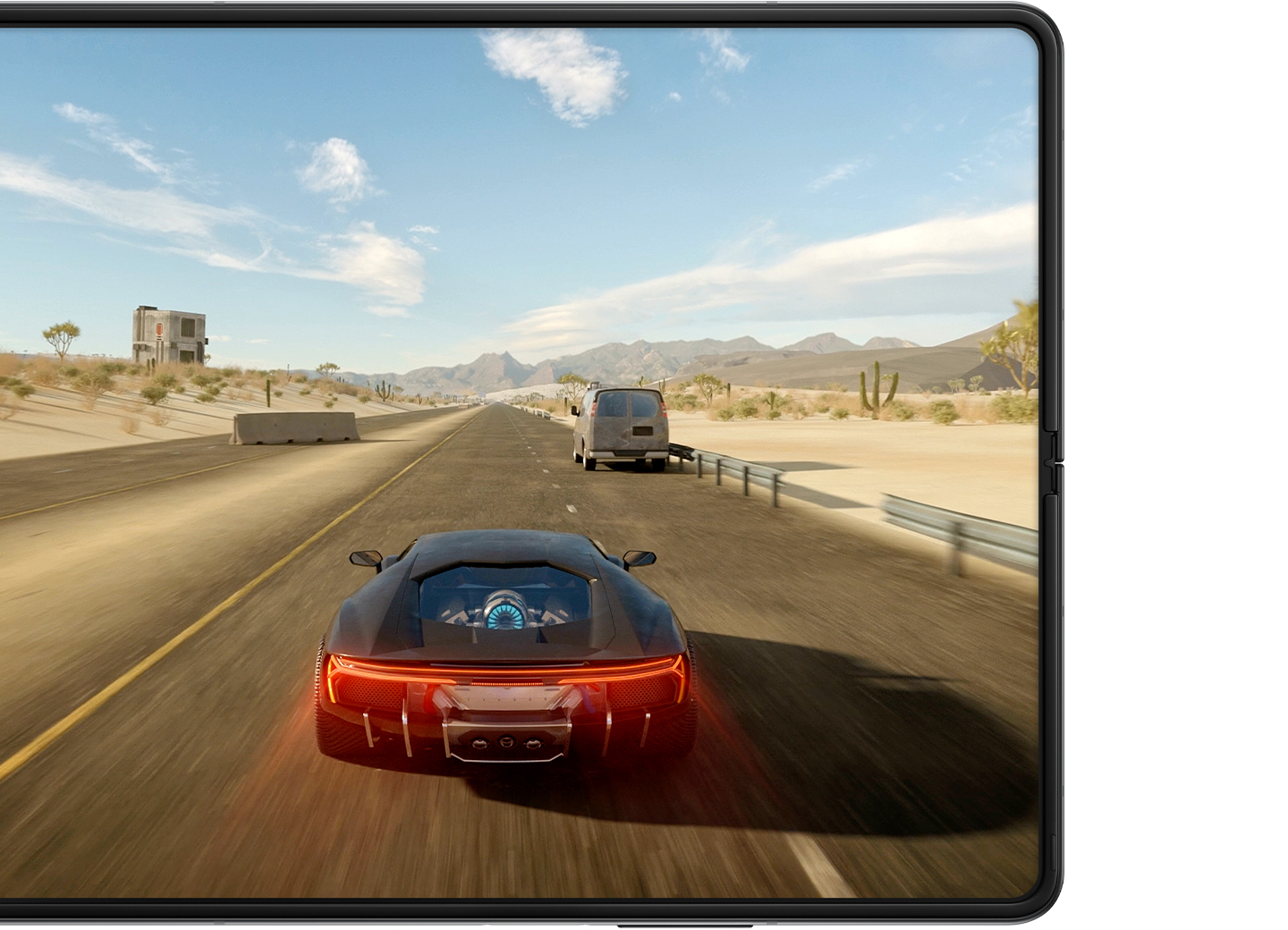 Unfolded Galaxy Z Fold3 5G with a scene from a game of a red car racing down a road on the Main Screen.